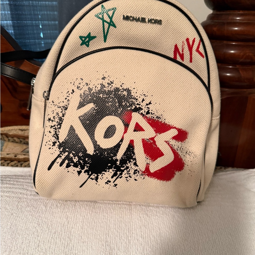 Michael Kors Cream Canvas Graffiti Mini Backpack with Black & Red Accents